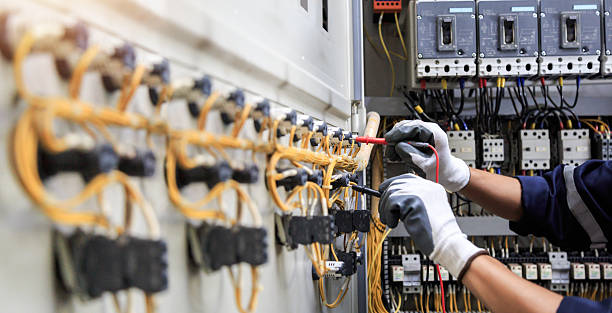 Professional Electrician technician working in Flowood, MS